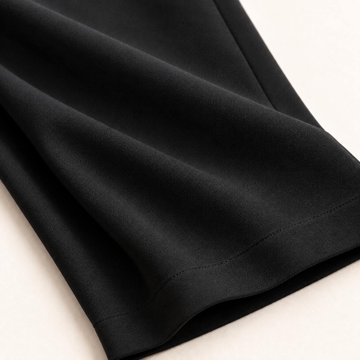Sculpt & Flex Pant black fabric and hem close-up